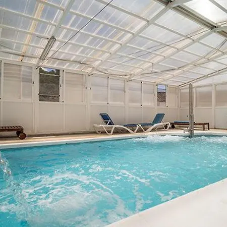 1- Con Piscina Climatizada